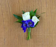White Spray Rose with Dark Blue Delphinium Boutonniere