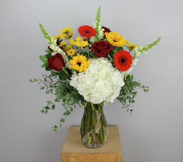 Behold the 'Black-Eyed Susan and Maryland Themed Floral Arrangement,' a vibrant celebration of Maryland's spirit and beauty.