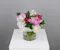 The "Peony Poetry" is an exquisite floral arrangement designed to captivate with its elegant and harmonious blend of colors and textures.