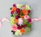 "Meadow Melody" is a delightful crate that combines the elegance of fine wine with the beauty of vibrant flowers.