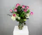 Embrace elegance with our floral arrangement featuring 1 dozen enchanting lavender roses paired with delicate white hydrangea.