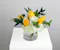 Half dozen roses with white hydrangea is a classic floral arrangement featuring a half dozen roses artfully arranged in a 5x5 clear glass cylinder vase